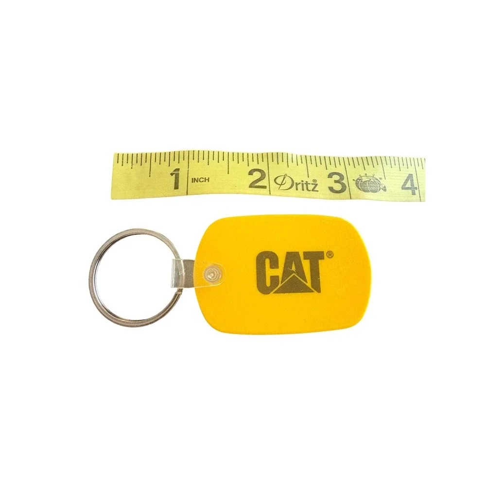 CAT Caterpillar Yellow Rubber Keychain Key Ring Construction Equipment Logo